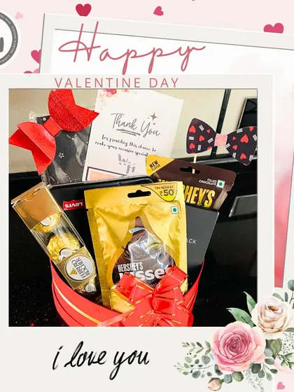 A simple and sweet "I love you" hamper for Valentine's Day. It includes Ferrero Rocher, Hershey's Kisses, and cute bow-tie decorations.