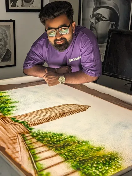 A different project for the Lodha Group, this time using colored sand to create a lush, green landscape.
