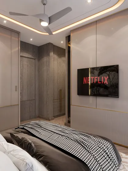 A different angle of the guest room, focusing on the TV wall and wardrobe. The monotone theme is broken by the warm wood texture and subtle gold accents, adding interest and elegance.