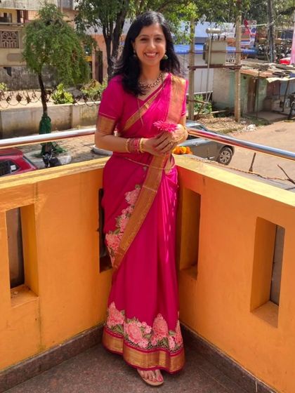 A client looking absolutely lovely in a pink pure Mysore crepe saree with floral embroidery. Thank you for the beautiful pictures.