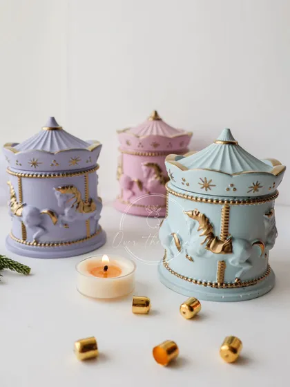 Add a sprinkle of magic with my Carousel trinket jars. Available in dreamy pastel shades and accented with hand-painted liquid gold, these jars are perfect for keeping your precious jewelry safe while adding a whimsical charm to your dresser.