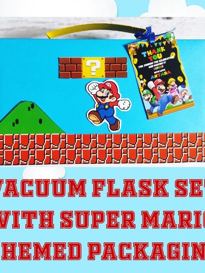 A close-up of the Super Mario themed gift box, which is designed to look like a level from the game.