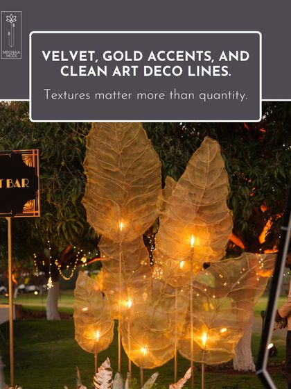 Texture matters more than quantity. Here, velvet, gold accents, and clean Art Deco lines create an expensive feel. My event design curriculum focuses on these subtle details that separate iconic designs from overdone themes.