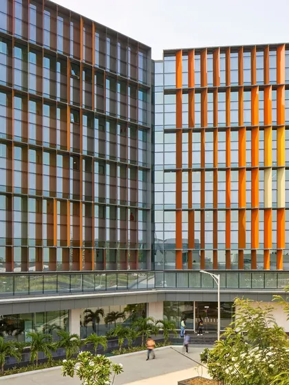 The Infosys Campus in Nagpur, awarded 'Silver' at the CII Design Excellence Awards, showcases our commitment to sustainable architectural design. The vibrant facade is a visual representation of the building's high-performance, energy-saving features.