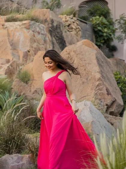 Walking through nature, her minimal glam makeup looks fresh and beautiful. The look was designed to be light and comfortable for a long day of shooting.