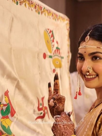 The joy of a Maharashtrian bride during her wedding rituals. My makeup is designed to be long-lasting and picture-perfect, capturing every happy moment.