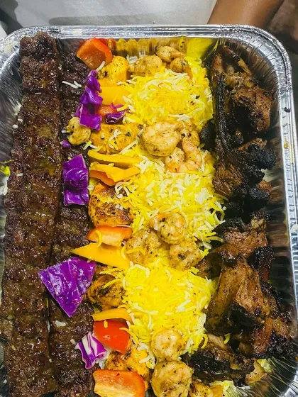 A glimpse of our exquisite Turkish Platter, a vibrant and flavorful assortment of grilled meats, kebabs, and fresh accompaniments. It's a perfect centerpiece for any gathering, offering a unique culinary journey.
