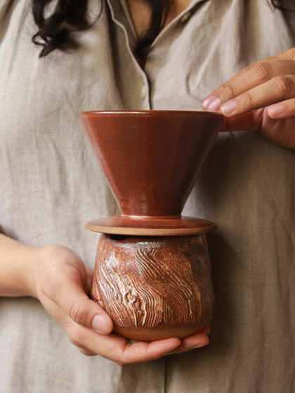 A pour over coffee set from the 'Dhora' collection, combining Aastha's love for specialty coffee and design with the organic textures of her pottery.