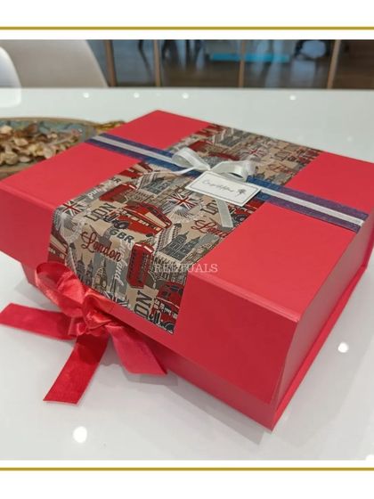 I now offer custom theme-based collapsible boxes. This one has a London theme, perfect for someone studying abroad. Just add your items and your gift is ready.