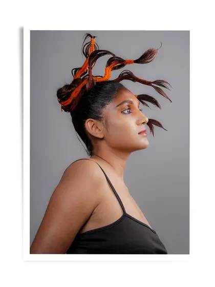 A creative, gravity-defying hairstyle by our student Vivek, inspired by the branches of a tree.
