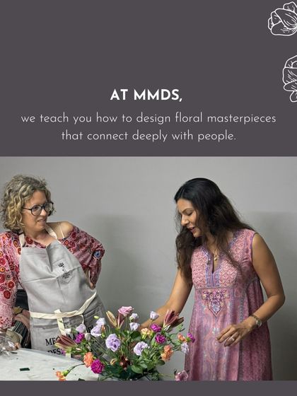 Here I am guiding a student through her arrangement. I teach my students how to create floral masterpieces that connect deeply with people, telling a story through every bloom.