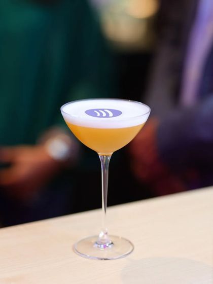 This is the 'Serenity of the Desert' cocktail, created for the Spotify Supper. It's made with earl grey infused gin, orange blossom water, and vegan foam, inspired by the "sounds of India."