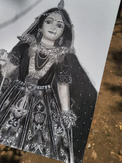 A closer look at the intricate details in my Radha Rani portrait. I spent hours on the patterns of her dress and jewelry, using fine-tipped pencils to ensure every element was perfect.