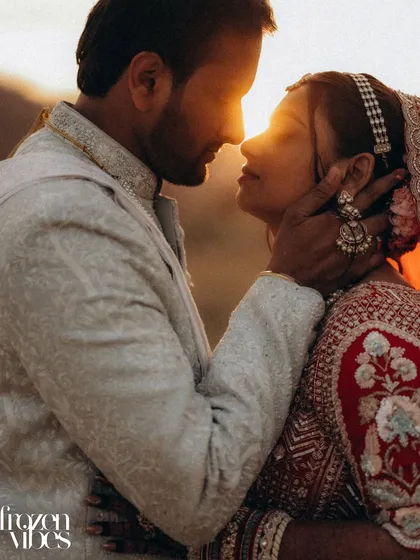 This is the kind of magic I live to capture. The sun dips low, creating a perfect golden flare as Malay and Nishi share a quiet, intimate moment. It’s more than a photo; it’s a feeling, frozen in time.