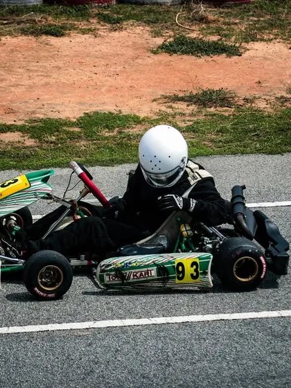 Our driver in the green and white Tony Kart, showing the variety of chassis we support.