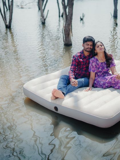 Another beautiful shot from the lake mattress series, this one capturing a more playful and relaxed interaction between the couple.