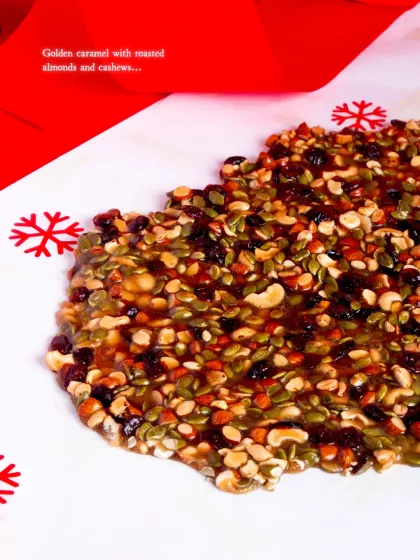 The brittle is made with golden caramel, roasted almonds, and cashews.