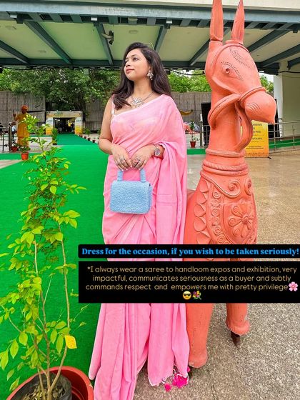 Dressing for the occasion is a power move. I always wear a saree to handloom expos because it communicates seriousness as a buyer and empowers me. This pink saree with a contrasting blue bag is a perfect example of using color to make a statement.