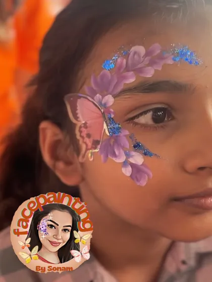 A whimsical butterfly design with purple flowers and blue glitter. A perfect choice for a magical party theme.