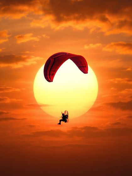 A moment of pure adventure, flying into the sun. I captured this paramotorist silhouetted against the setting sun during Gujarat's Dharoi Adventure Fest, using a long lens to create this perfectly timed, dramatic shot.