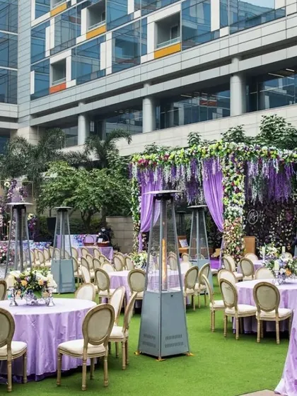 We manage all logistical aspects of your event, including large scale guest seating. This elegant outdoor setup with lavender themed decor and strategically placed heaters ensures guest comfort for a daytime conference or an evening gala dinner.