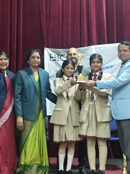 Our students excel in future-focused fields like robotics. Here, our senior team receives the first prize at the Robozest 2.0 competition for their innovative 'Blind Man Stick' project, a testament to their technical skills and creativity.