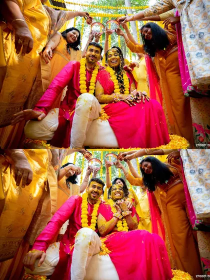 A happy group photo of the couple being blessed by family during their haldi.