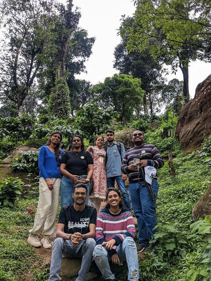 A group photo on a forest trail in Wayanad.