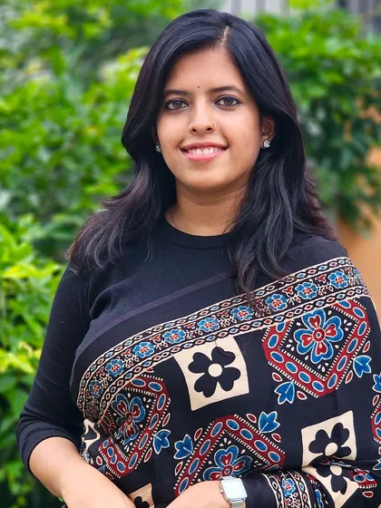 A client looking chic and traditional in a beautiful Ajrakh saree. The intricate hand-block print is perfect for those who love the charm of traditional wear.