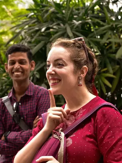 The joy of learning something new and meaningful. This volunteer's smile captures the spirit of our sign language workshops, where every session is filled with discovery.