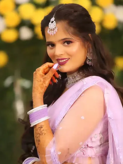 A beautiful close-up of the bride, her smile and makeup looking absolutely perfect for her sangeet.