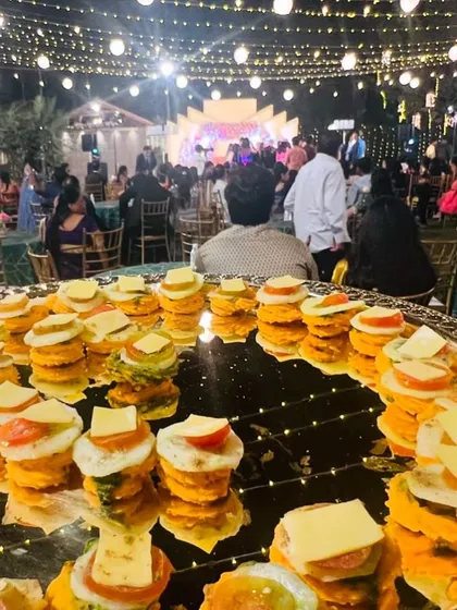 My signature Muruku Sandwich is a crowd favourite. This platter, ready for a wedding reception, shows how I blend traditional flavours with a modern, bite-sized presentation that guests love.