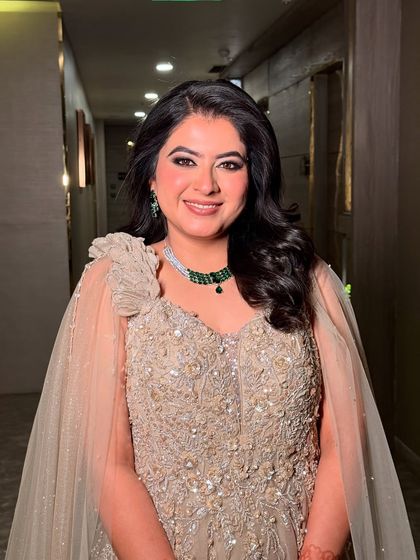 Sanchi, all smiles on her engagement night. My goal is to make my clients feel happy and confident.