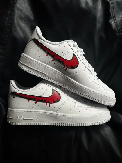 Another pair shot of the red drip custom sneakers.