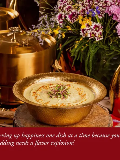 We serve happiness one dish at a time. This beautiful hammered-brass bowl of hummus, garnished with microgreens, is part of a larger wedding spread designed to create a flavor explosion.