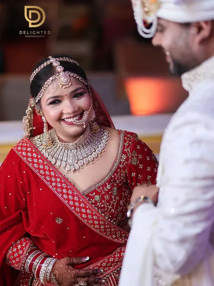 The pure, unscripted joy of a wedding day. My goal is to capture candid moments like this one, where the bride's spontaneous laughter tells you everything you need to know about her happiness.