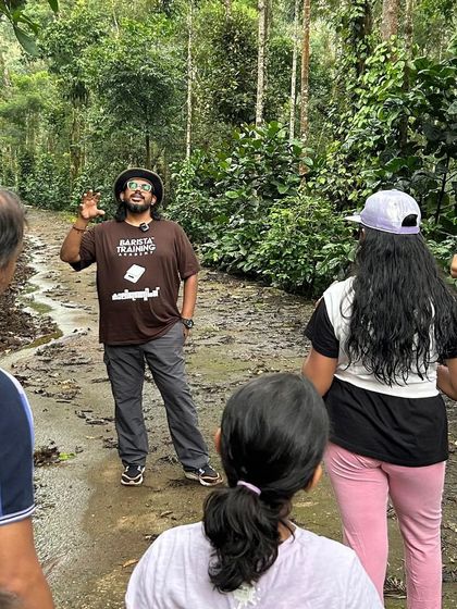 An outdoor classroom in the middle of a coffee estate. There's no better place to learn about coffee than right where it grows.