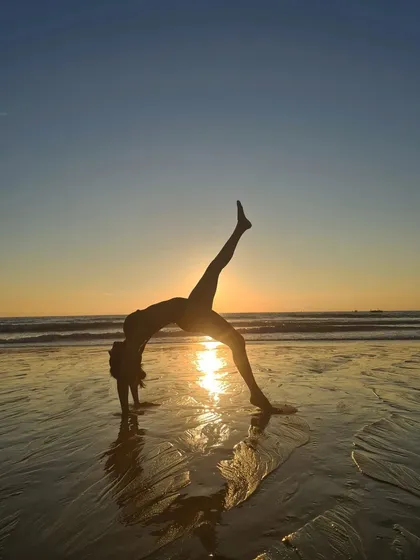 A moment of peace and connection at sunset. This variation of Wild Thing on the beach is a reminder that yoga is a practice we can take anywhere. It’s about bending so you don’t break, finding flexibility not just in the body, but in the mind and spirit too.