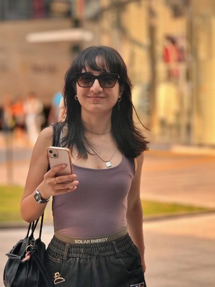 A closer look at the custom pants, showing the fit and the "SOLAR ENERGY" waistband detail. I often add small, unexpected elements to my designs to make them special.