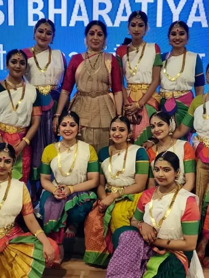 A group photograph with my talented students after our performance at the Pravasi Bharatiya Divas. Their dedication and energy are the backbone of all our group productions.