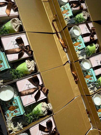 Stacks of our beautifully curated corporate gift boxes. This image showcases the scale of orders we can handle while maintaining a high standard of quality and aesthetic appeal.