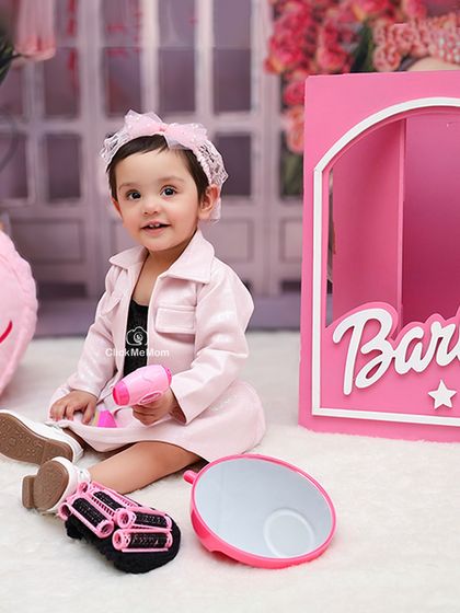 Posing with her Barbie box. We can create a life-sized toy box to make your child feel like they are truly part of the Barbie world.