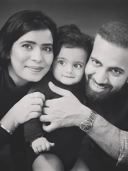 Capturing the joy and laughter of family life in classic black and white. These candid moments are often the most precious.