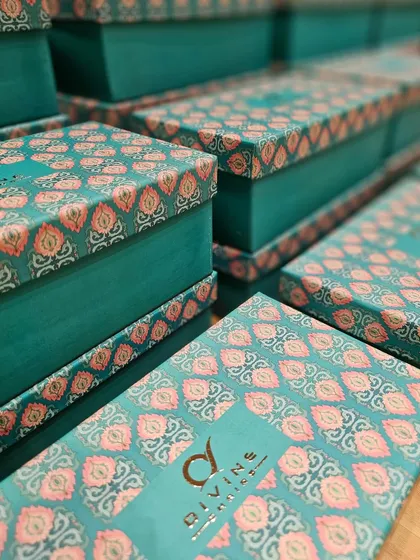 Here is another custom box design I created for Divine Chairs. This version features a beautiful teal color with a traditional Indian block print pattern on the lid, showcasing how we can tailor designs to fit different aesthetics, from modern to classic.