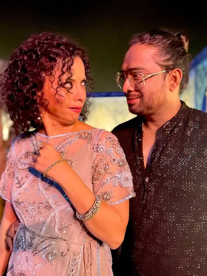 Sharing a light-hearted moment with my partner after a successful event. The journey of creating a sangeet involves immense hard work, but also a lot of fun and camaraderie.