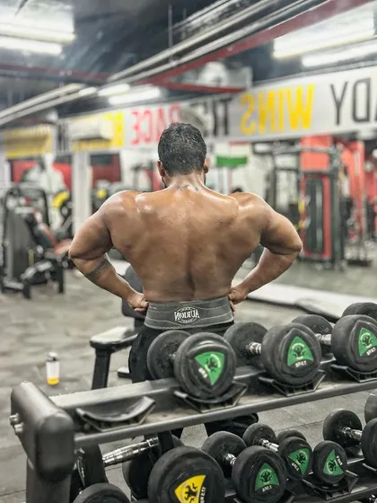 The back view of my recent gains. Building a thick, powerful back is a top priority.