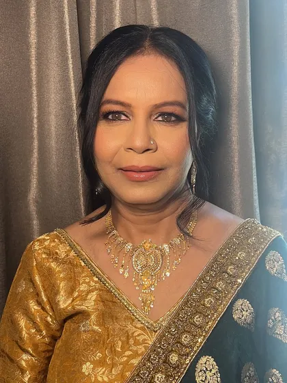 Makeup for mature skin is about enhancing, not hiding. For this lovely client attending a wedding, I focused on creating a luminous glow with a soft, smudged liner and a touch of shimmer to let her natural beauty shine with elegance.