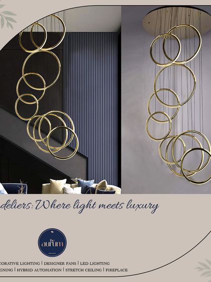 This cascading chandelier of interconnected gold rings is a modern classic. It's a sculptural piece that works beautifully in a contemporary home, adding a touch of artistic flair and warm, ambient light.