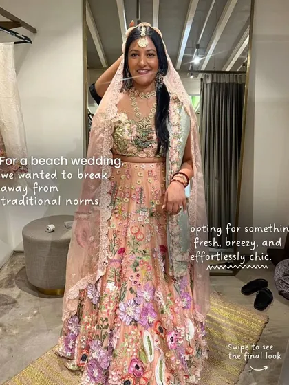 For Hena's beach wedding, we wanted something fresh and breezy. This floral lehenga was the perfect choice, and here you can see us doing the final draping and styling to ensure every detail is perfect for her walk down the aisle.