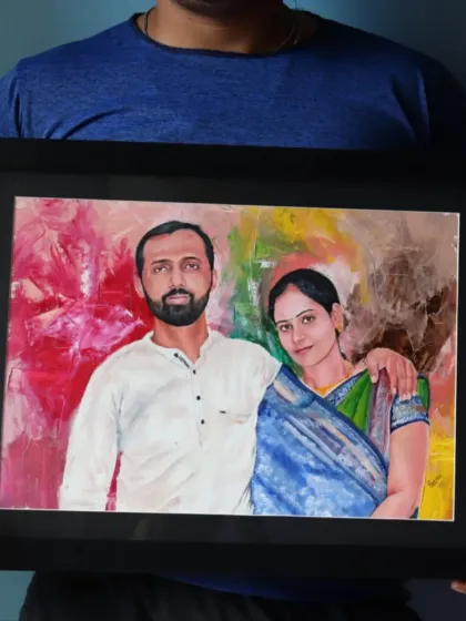 A framed oil painting of a couple against an abstract, colorful background. This style adds a modern and artistic touch to a traditional portrait.